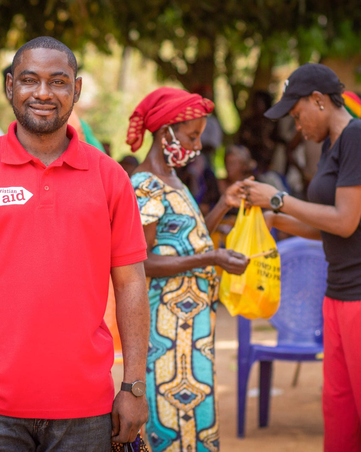 Christian Aid field team during a community distribution documented by Latitude Space Africa